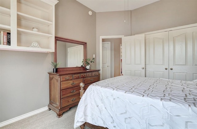 carpeted bedroom with a closet