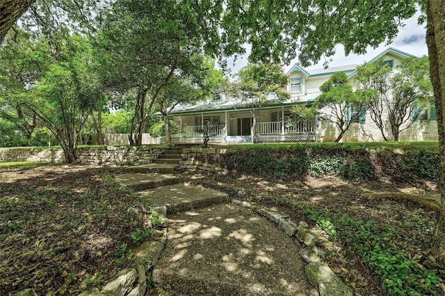 view of yard with a porch