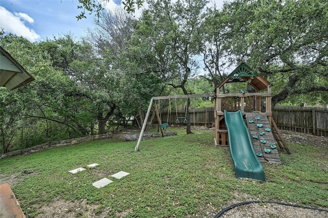 view of play area featuring a lawn