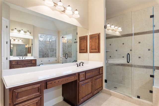 bathroom featuring vanity, tile patterned floors, and an enclosed shower