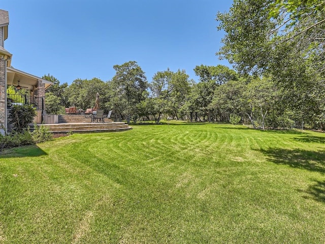 view of yard with a deck