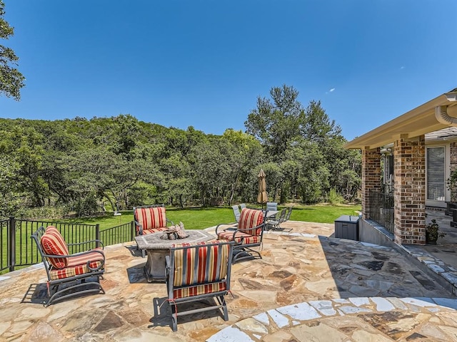 view of patio / terrace with a fire pit