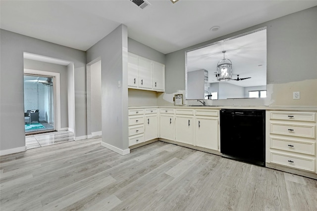 kitchen with pendant lighting, dishwasher, light hardwood / wood-style floors, and a chandelier