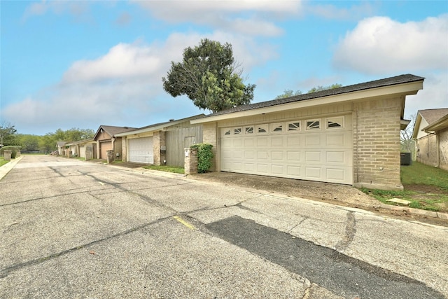 single story home with a garage