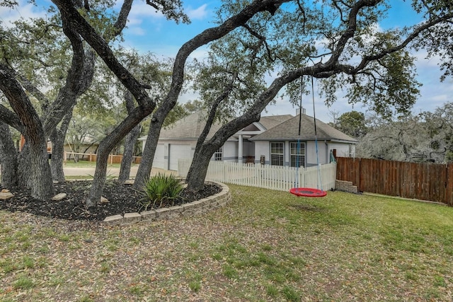 view of yard with a garage