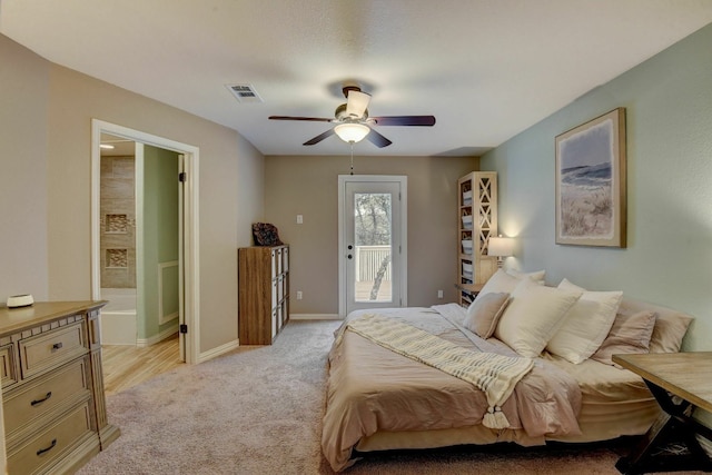 bedroom with access to exterior, light wood-type flooring, and ceiling fan