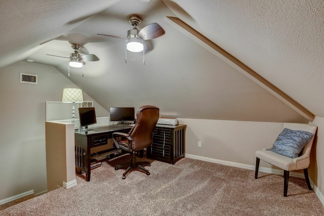 office with ceiling fan, light colored carpet, lofted ceiling, and a textured ceiling