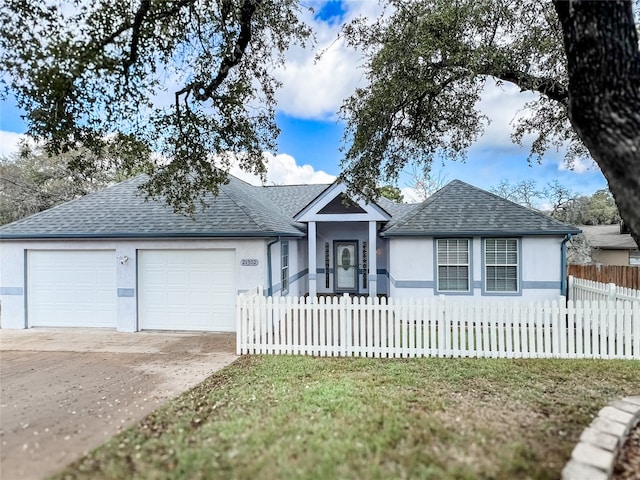 single story home with a garage