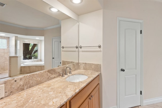 bathroom with crown molding, tiled bath, vanity, and tile patterned floors