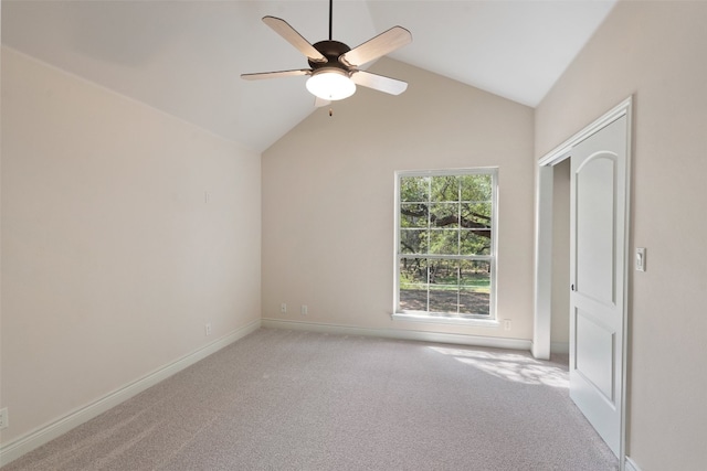 interior space with vaulted ceiling and ceiling fan