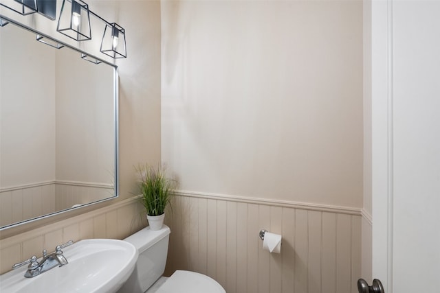 bathroom with sink and toilet