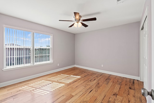 interior space with ceiling fan and light hardwood / wood-style flooring