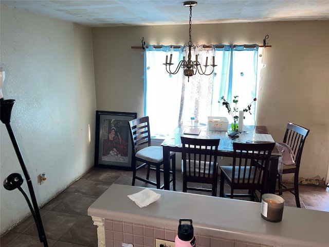 dining area featuring a notable chandelier