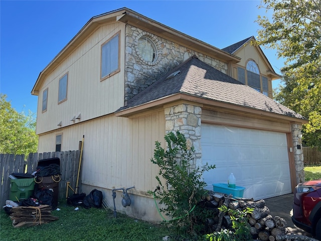 view of property exterior featuring a garage