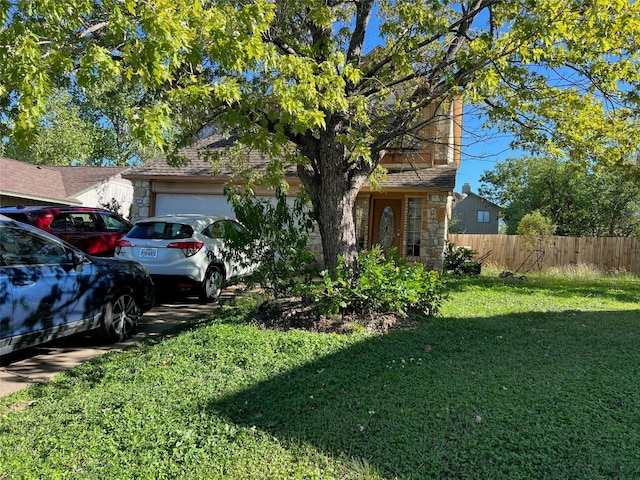 view of yard featuring a garage