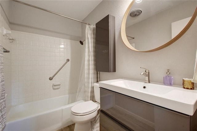 full bathroom with toilet, shower / bathtub combination with curtain, and vanity