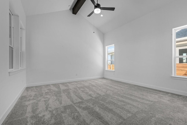 empty room featuring beam ceiling, high vaulted ceiling, carpet flooring, baseboards, and ceiling fan