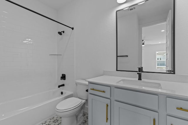 bathroom with vanity, shower / bathing tub combination, toilet, and visible vents