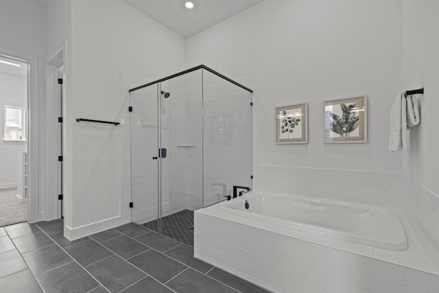6508 Cowman Way, Austin, TX 78747 - bathroom with a shower stall, a bath, tile patterned flooring, and recessed lighting
