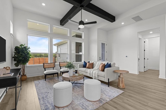 6508 Cowman Way, Austin, TX 78747 - living room featuring recessed lighting, beamed ceiling, light wood finished floors, and ceiling fan