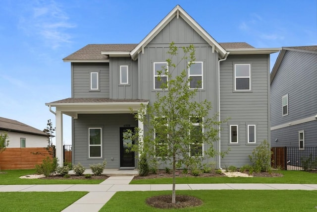 6508 Cowman Way, Austin, TX 78747 - view of front of property with board and batten siding, covered porch, and a shingled roof