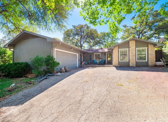 ranch-style home with a garage