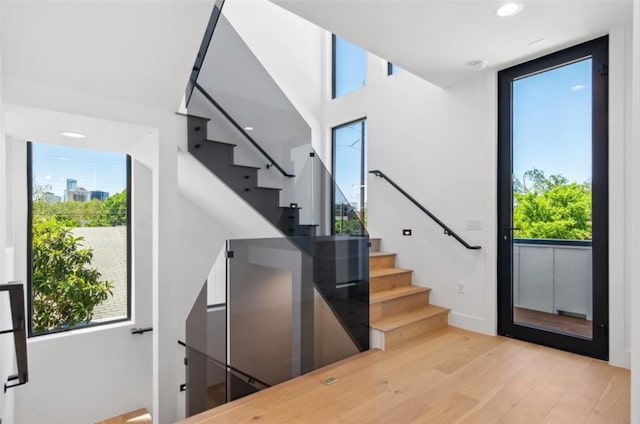 staircase featuring hardwood / wood-style flooring