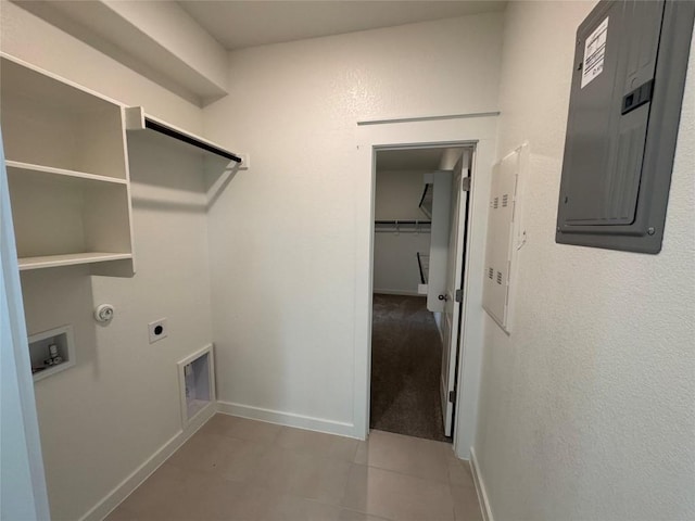 washroom with laundry area, electric panel, baseboards, hookup for an electric dryer, and washer hookup