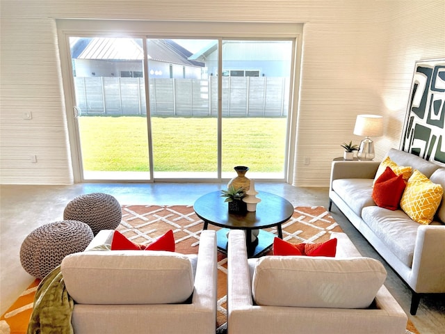 living room with concrete flooring