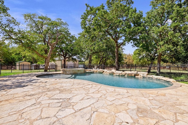 view of swimming pool featuring a patio area