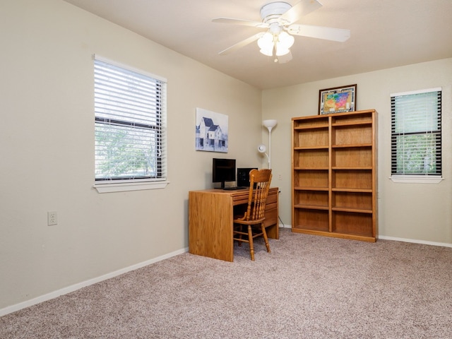 home office featuring carpet and ceiling fan