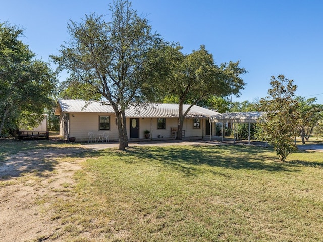 view of front of property featuring a pergola, a patio area, and a front yard