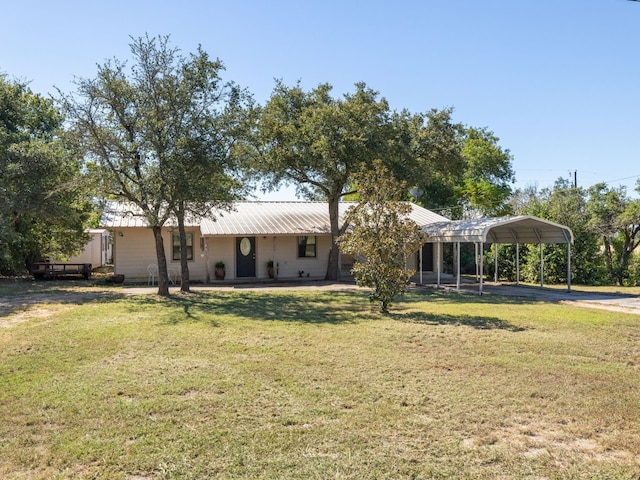 view of yard featuring a carport