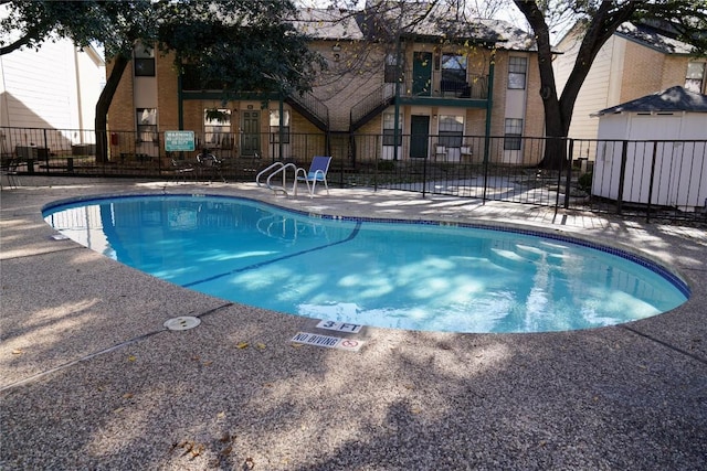 view of pool with a patio area