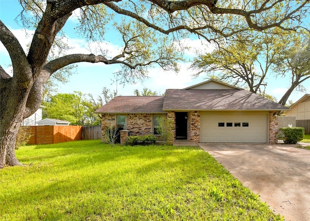 ranch-style house with a garage and a front yard