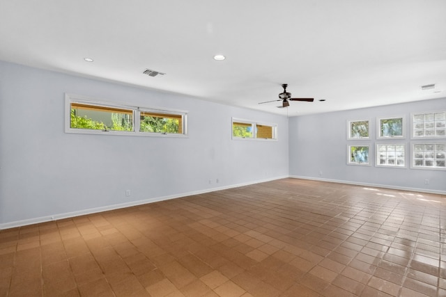 spare room featuring ceiling fan