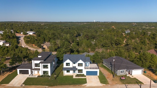 bird's eye view with a view of trees