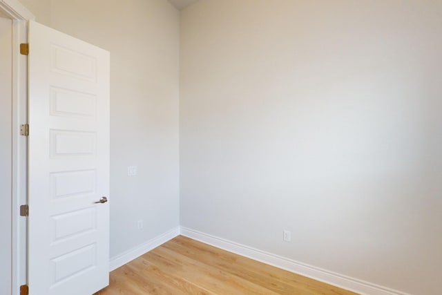 spare room with light hardwood / wood-style floors