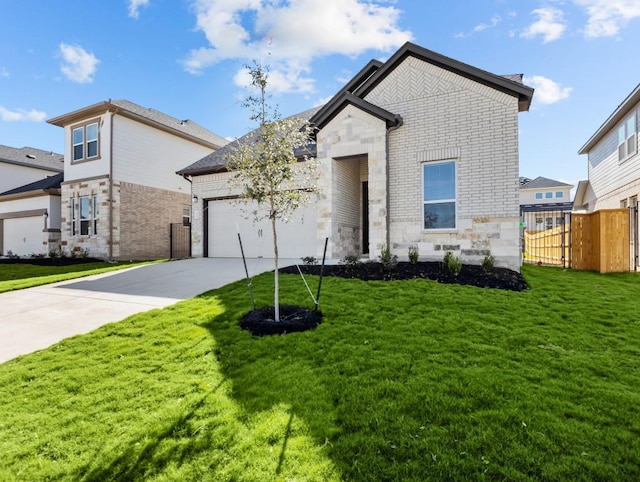 view of front facade featuring a garage and a front yard