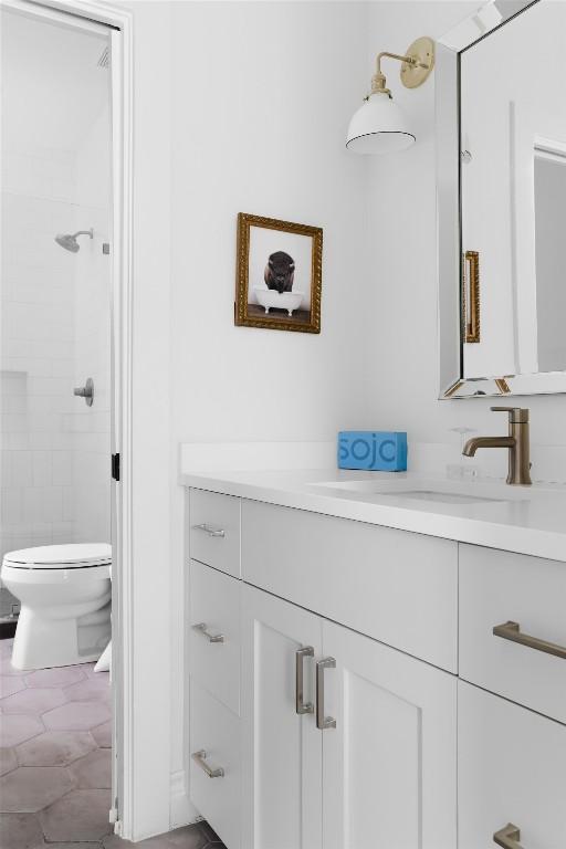 11505 SW Oaks, Austin, TX 78737 - full bath with vanity, toilet, and tiled shower