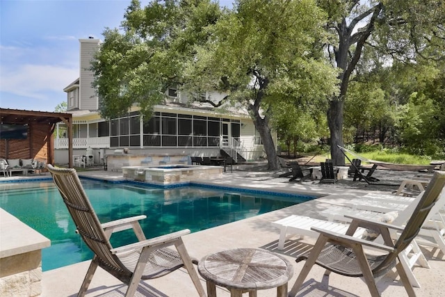 11505 SW Oaks, Austin, TX 78737 - outdoor pool with a sunroom, a patio area, and an in-ground hot tub