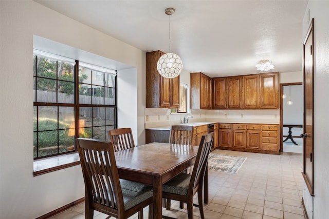 dining room featuring sink