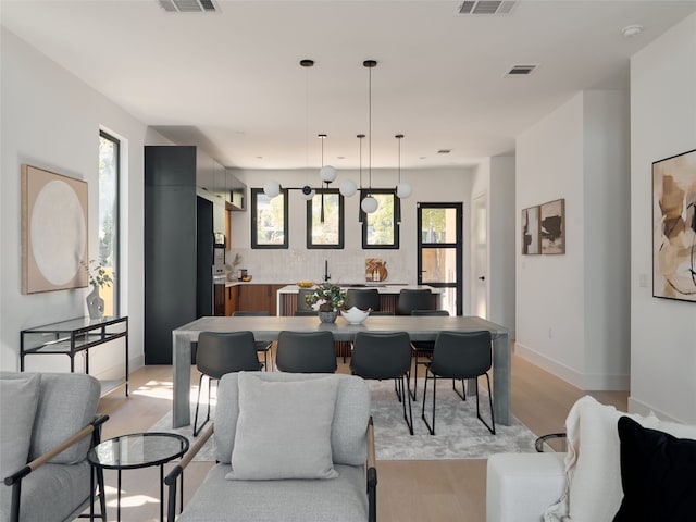 dining room featuring light wood-type flooring