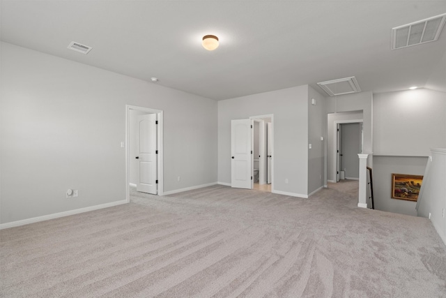 unfurnished living room with light carpet