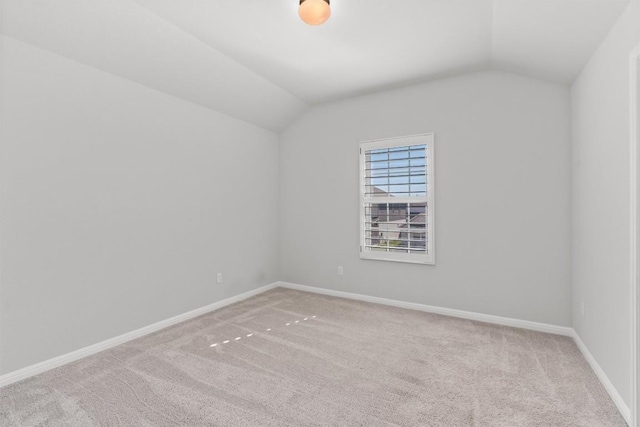 13104 Cerro Castellan Trce, Manor, TX 78653 - carpeted empty room with lofted ceiling and baseboards