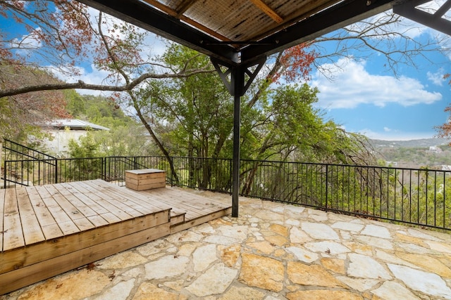 view of patio / terrace featuring a deck with mountain view