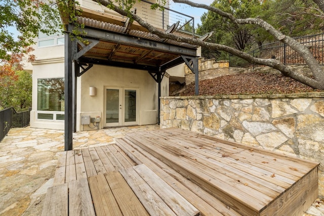 wooden deck featuring french doors