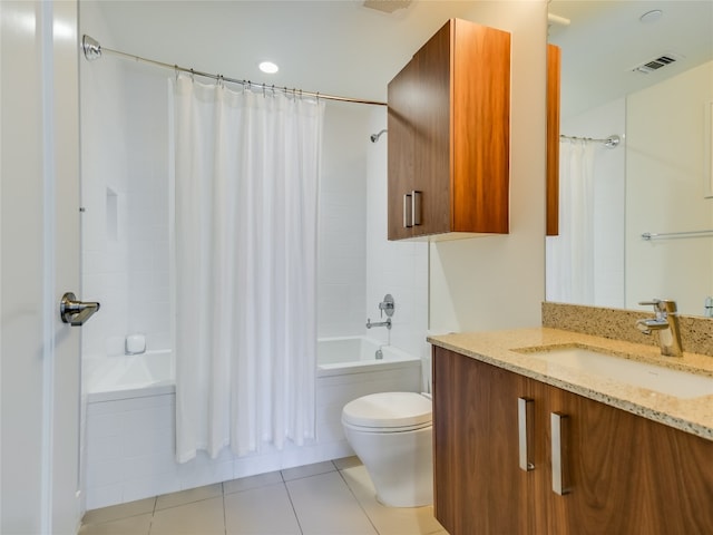 full bathroom featuring tile patterned flooring, shower / bathtub combination with curtain, toilet, and vanity