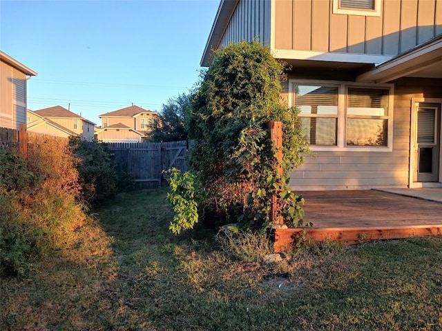 view of yard with a wooden deck