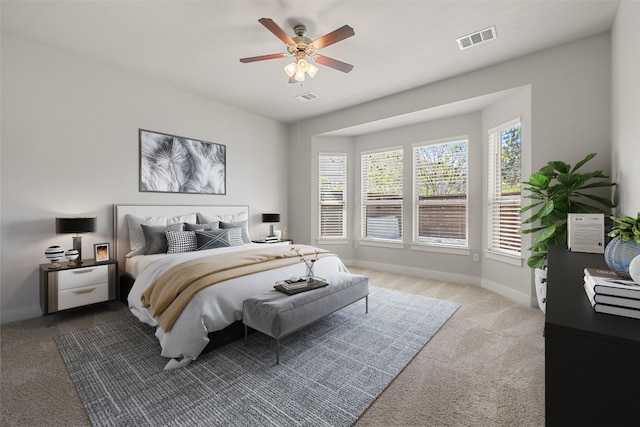 bedroom featuring ceiling fan and carpet flooring